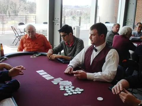 Casino2U Team Member Dealing Cards